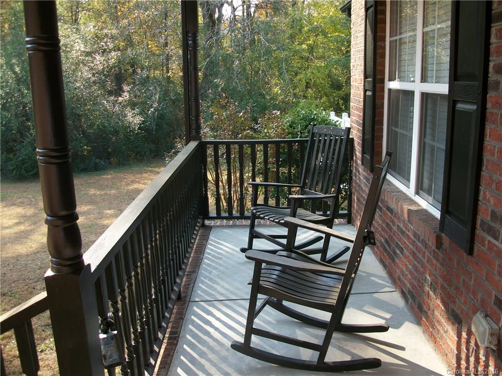 2118 Doster Road, Unit 1 Monroe, NC 28112 - Photo 2 of 24 a view of balcony with wooden floor and outdoor seating