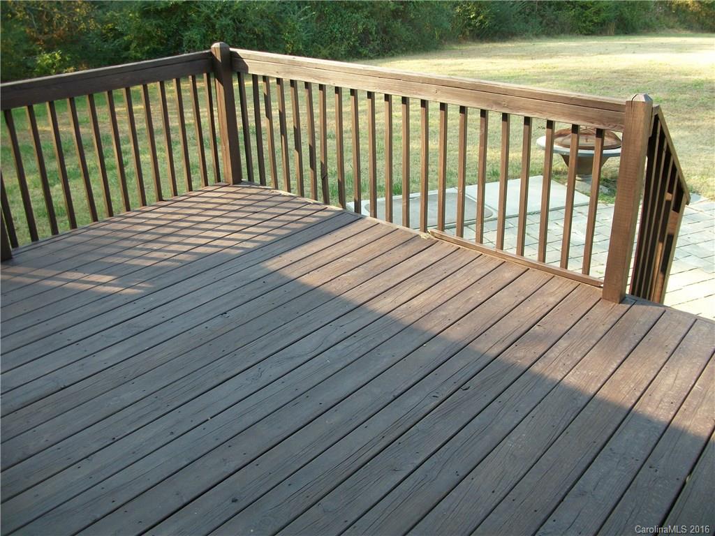 2118 Doster Road, Unit 1 Monroe, NC 28112 - Photo 20 of 24 a balcony with wooden floor
