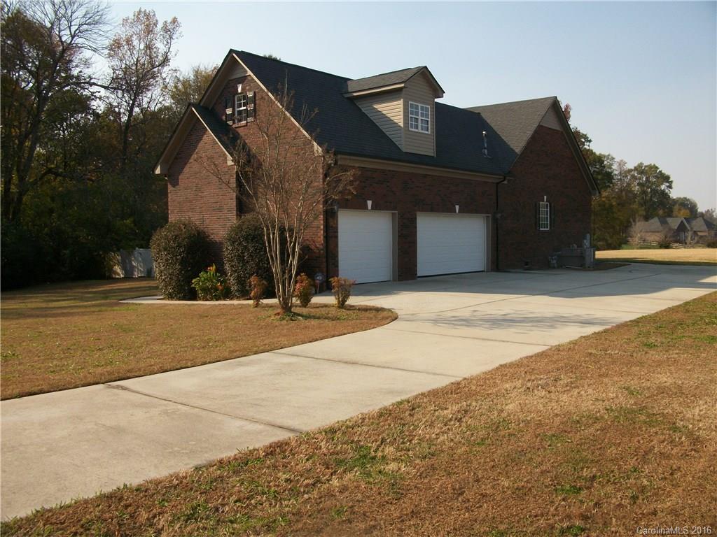 2118 Doster Road, Unit 1 Monroe, NC 28112 - Photo 22 of 24 a view of a building with a outdoor space