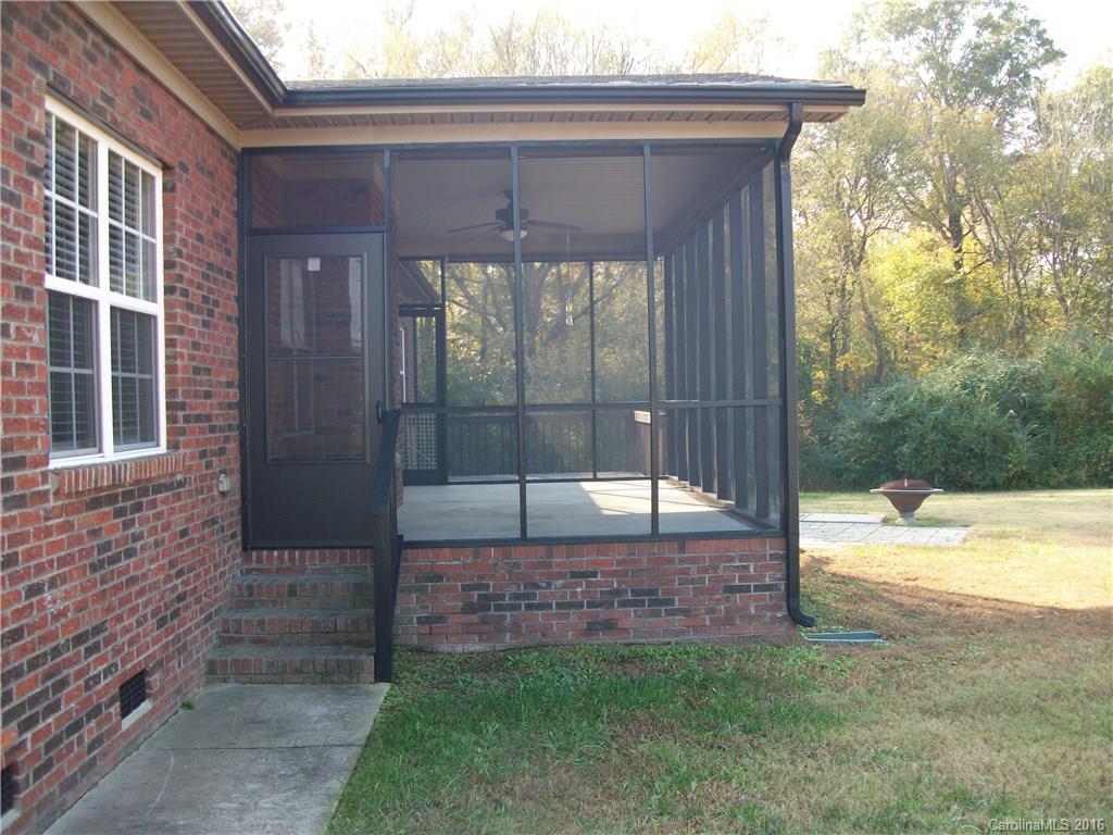 2118 Doster Road, Unit 1 Monroe, NC 28112 - Photo 23 of 24 a view of a pathway of a house with backyard