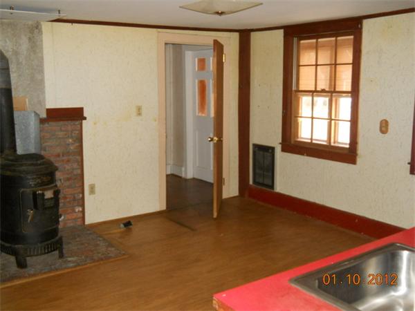 34 Morse Road Royalston, MA 01368 - Photo 5 of 15 a view of an empty room with a window