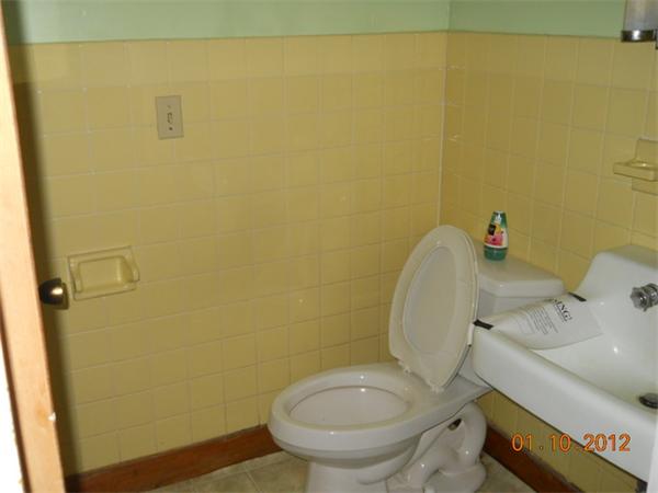 34 Morse Road Royalston, MA 01368 - Photo 10 of 15 a bathroom with a sink and a toilet