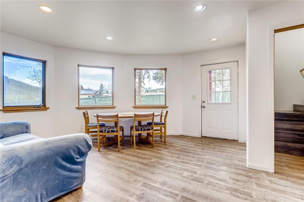 27 Rasor Court Keystone, CO 80435 - Photo 17 of 30 a living room with furniture and a dining table