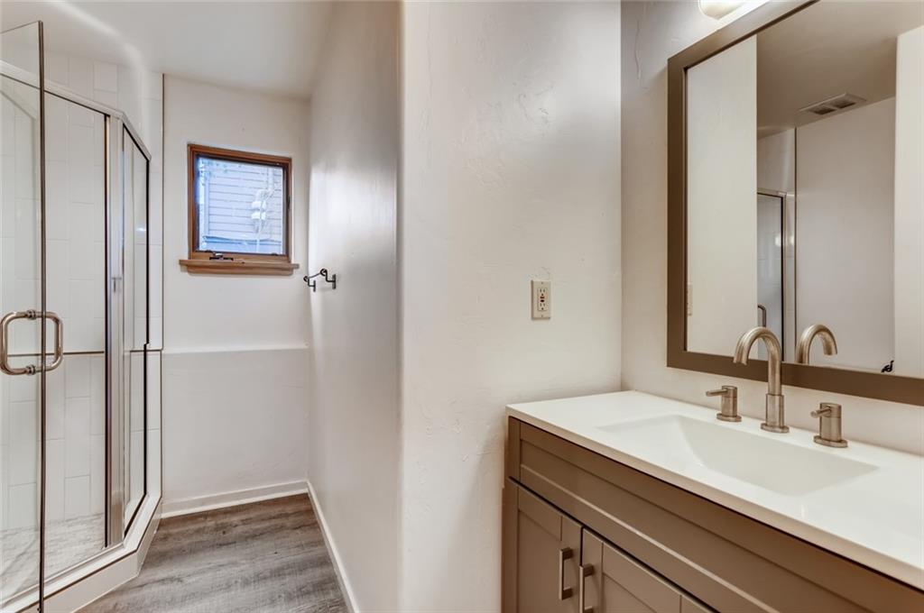 27 Rasor Court Keystone, CO 80435 - Photo 24 of 30 a bathroom with a sink and a mirror