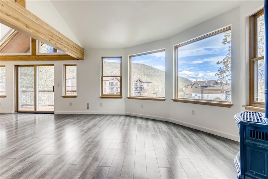 27 Rasor Court Keystone, CO 80435 - Photo 4 of 30 an empty room with wooden floor and windows