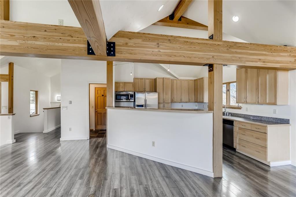 27 Rasor Court Keystone, CO 80435 - Photo 8 of 30 a view of a kitchen cabinets and wooden floor