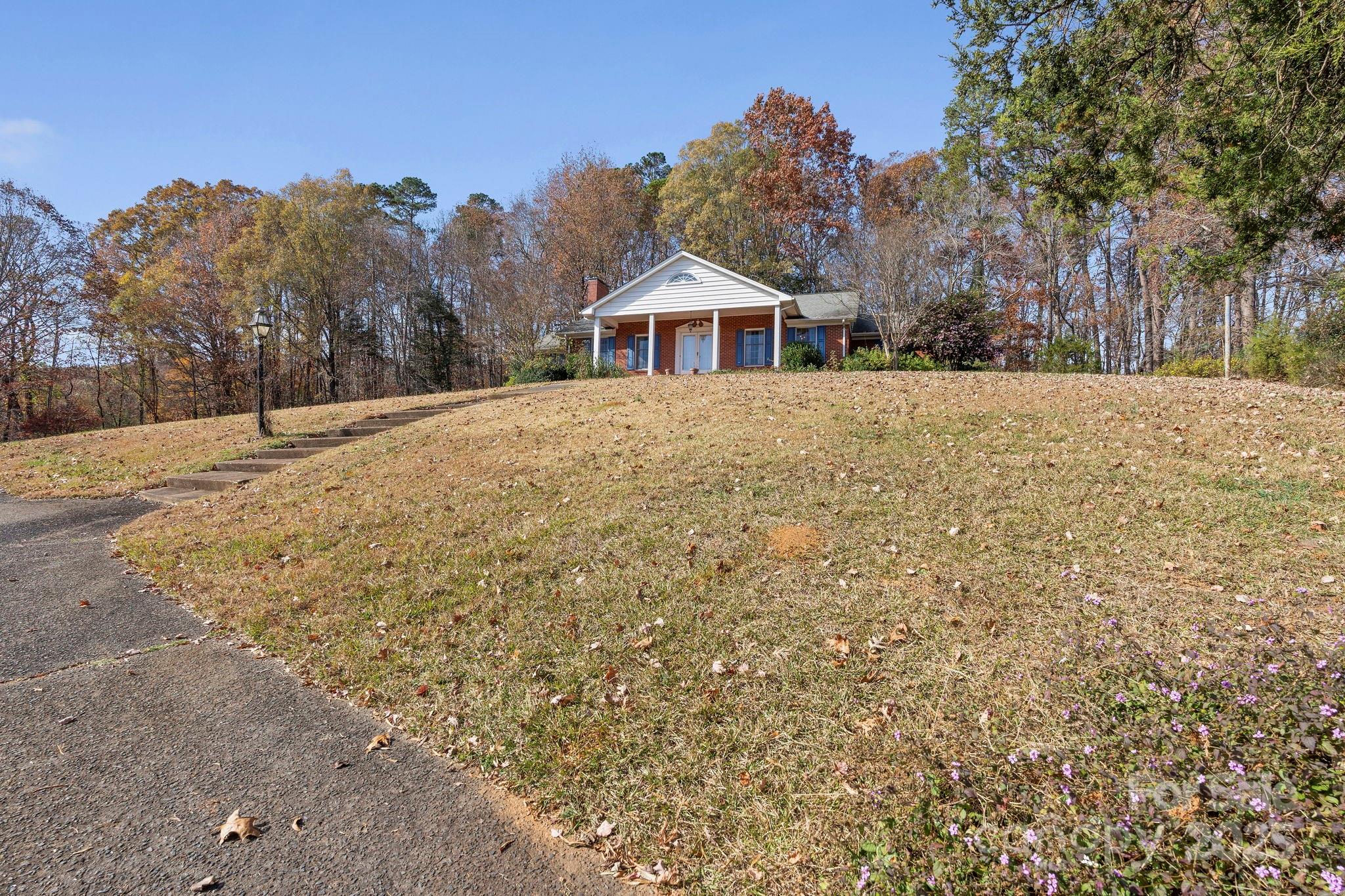 44372 Vickers Store Road Albemarle, NC 28001 - Photo 15 of 42 a house with a outdoor space