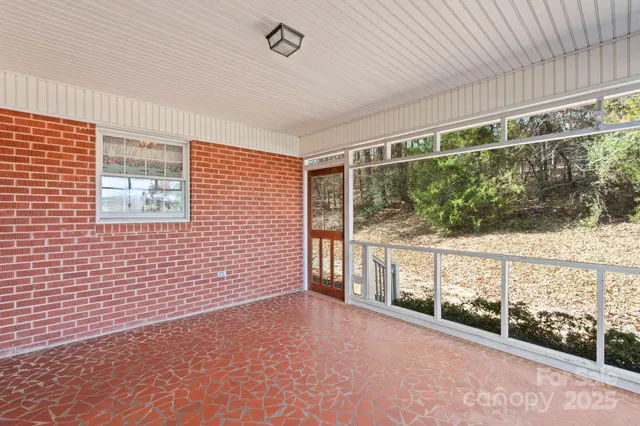a view of a large window with an outdoor space