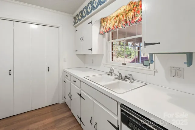a bathroom with a double vanity sink and mirror