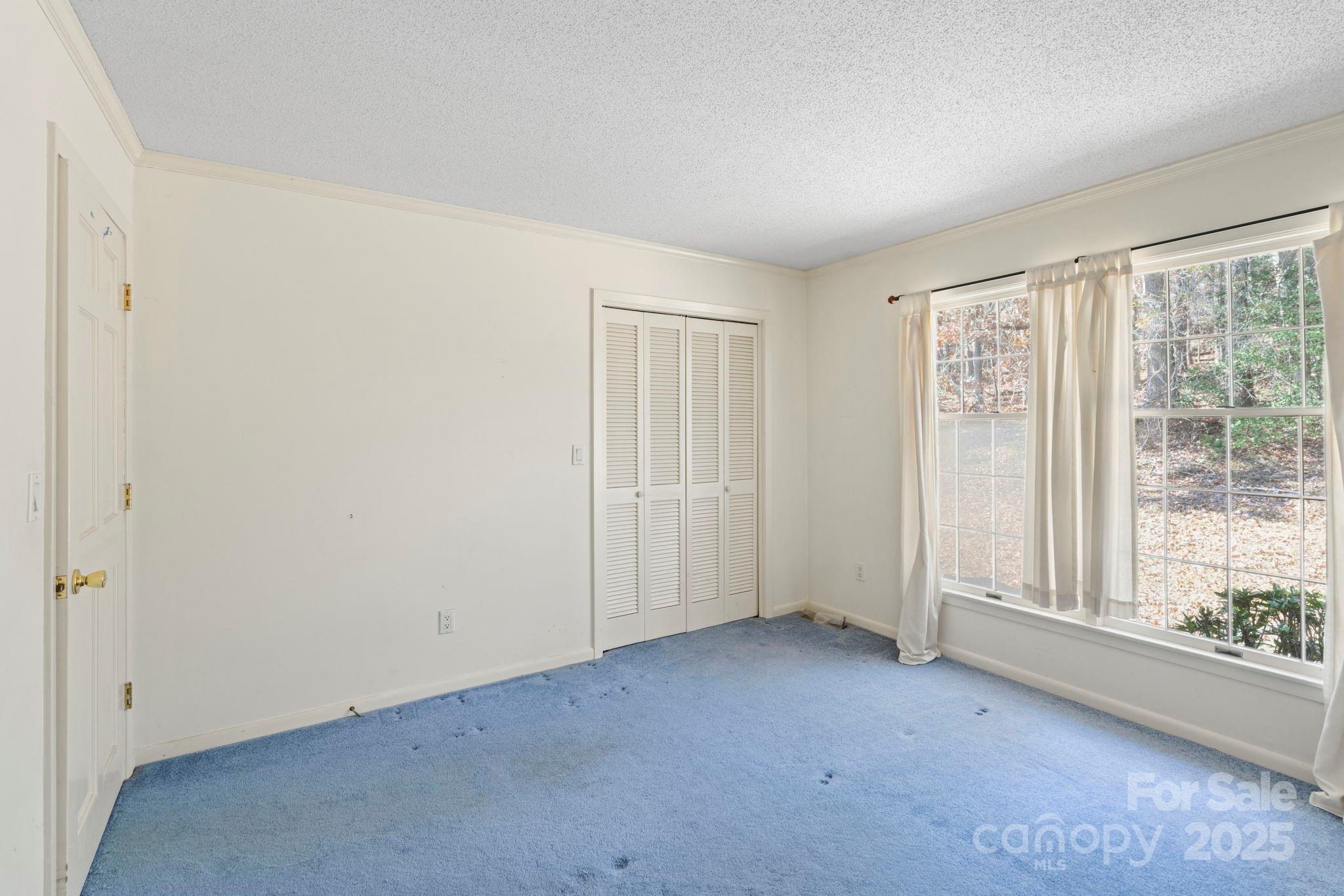 44372 Vickers Store Road Albemarle, NC 28001 - Photo 25 of 42 an empty room with windows