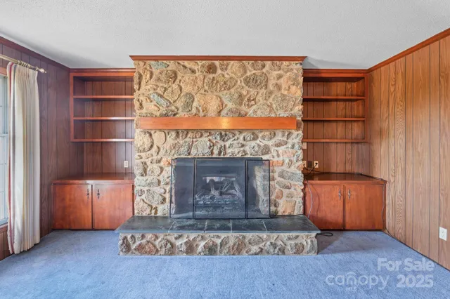 a view of livingroom with furniture and chandelier