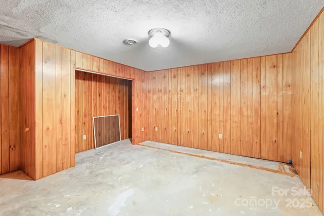 a view of a livingroom with wooden floor