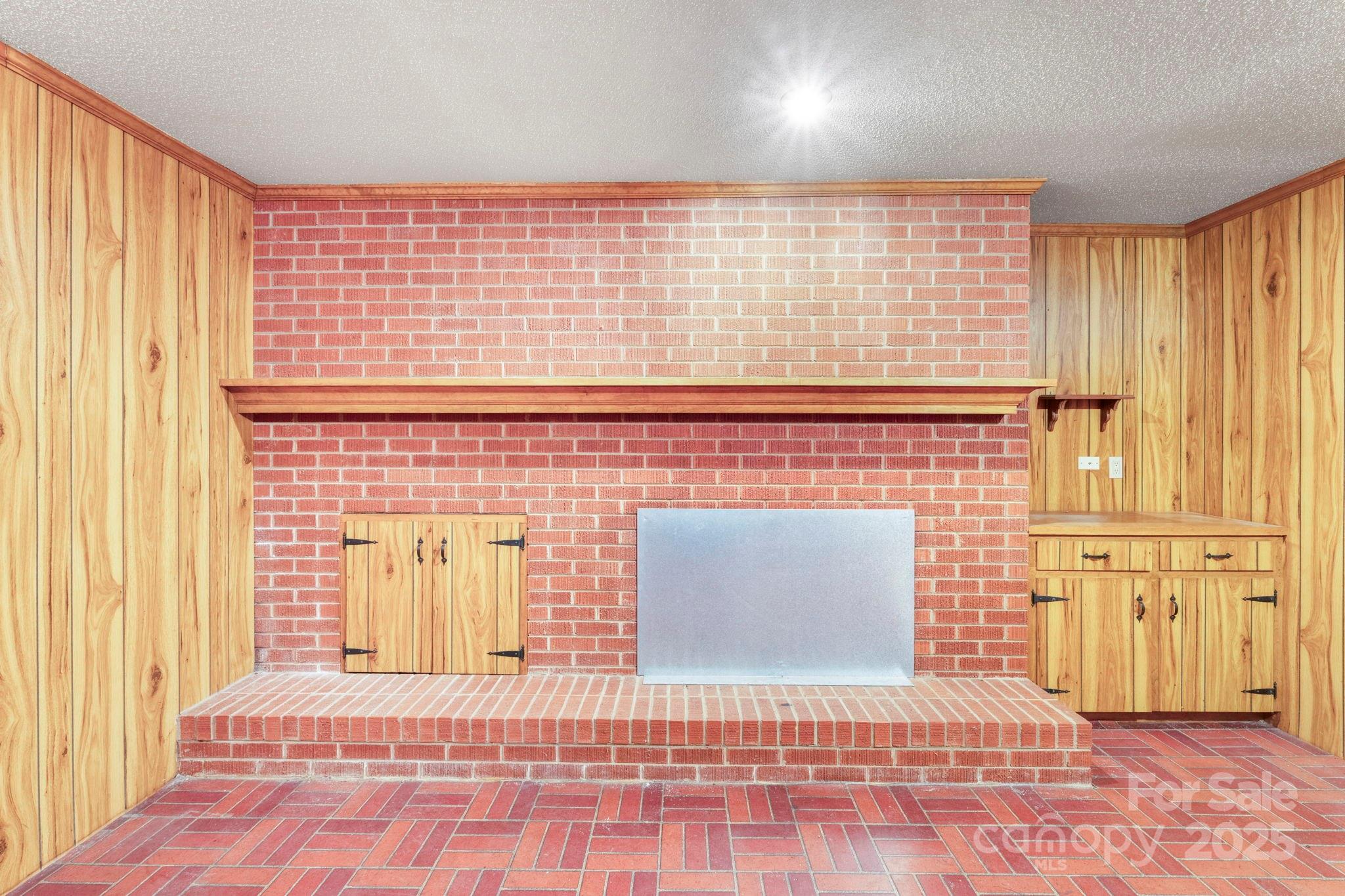 44372 Vickers Store Road Albemarle, NC 28001 - Photo 42 of 42 a view of a hallway with a door and wooden floor