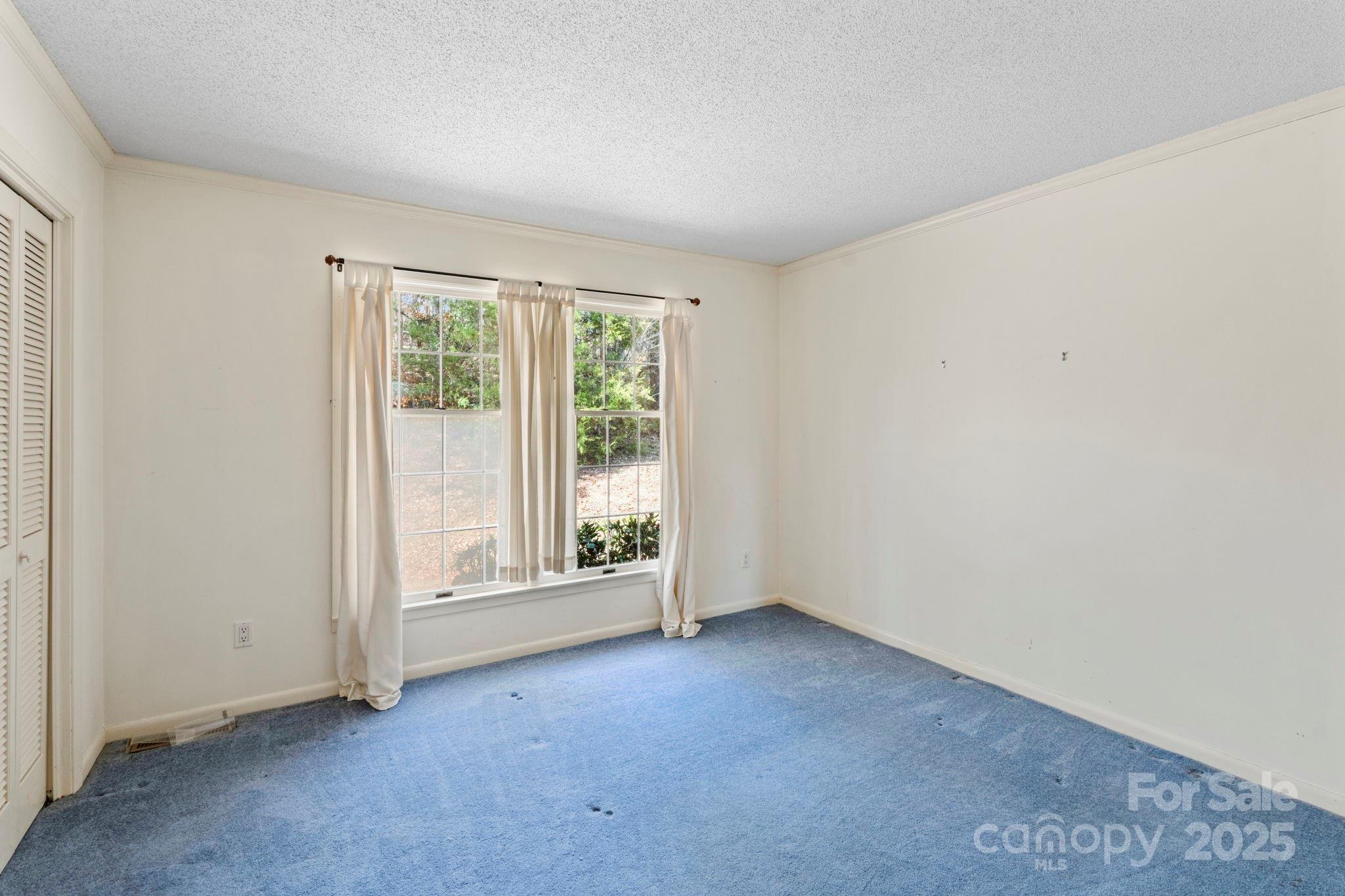 44372 Vickers Store Road Albemarle, NC 28001 - Photo 9 of 42 an empty room with windows