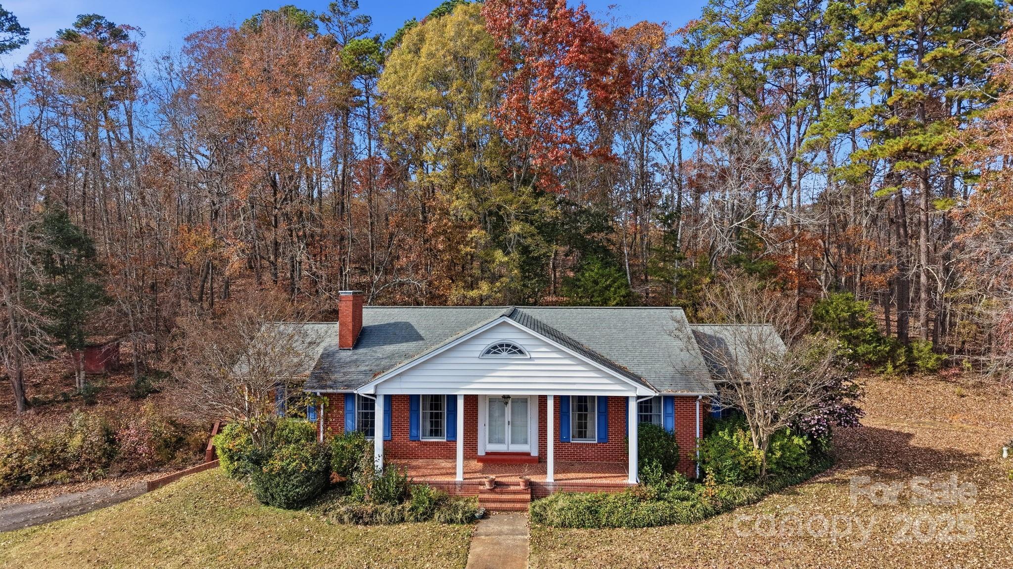 44372 Vickers Store Road Albemarle, NC 28001 - Photo 10 of 42 a front view of a house with garden
