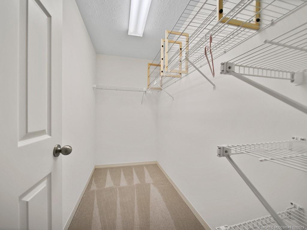 5 Copaire Road Stuart, FL 34996 - Photo 18 of 26 a view of a room with racks on the wall