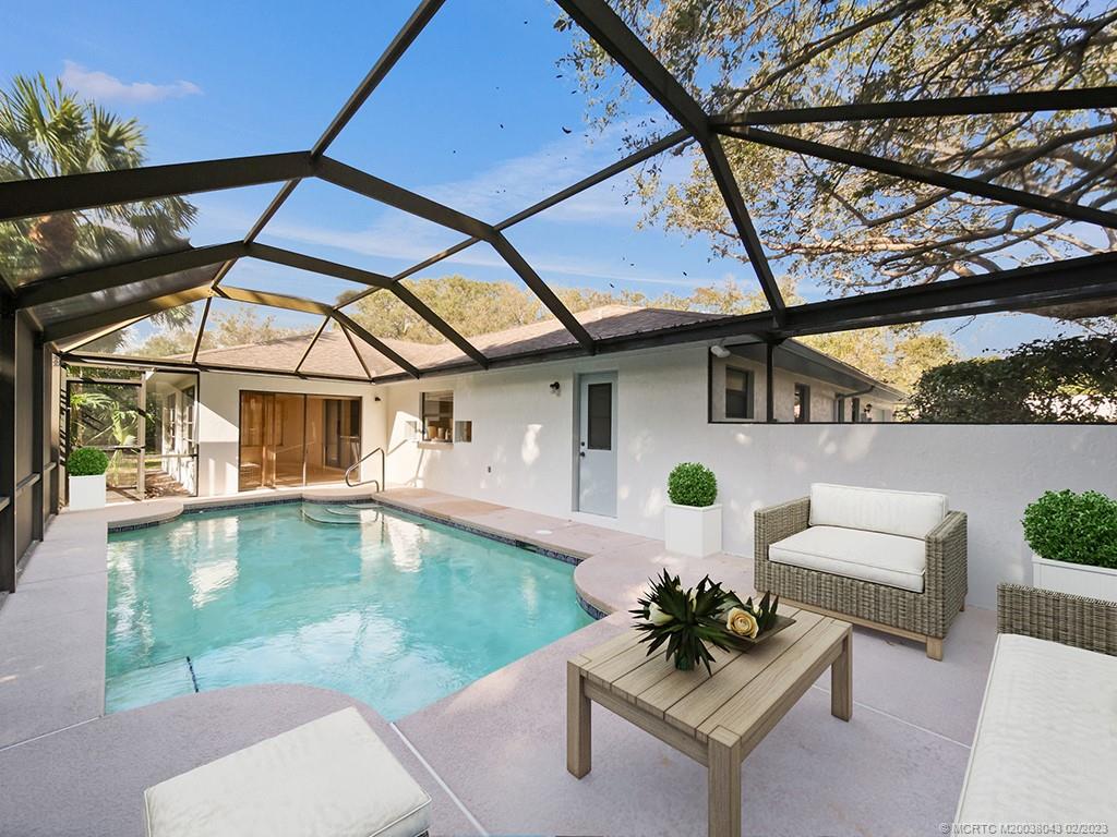 5 Copaire Road Stuart, FL 34996 - Photo 23 of 26 a view of swimming pool with a patio