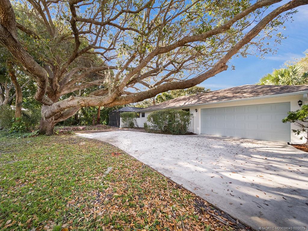 5 Copaire Road Stuart, FL 34996 - Photo 5 of 26 a view of a backyard of the house