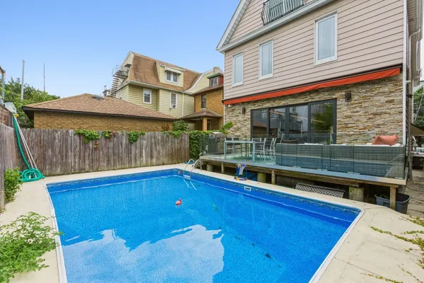 a view of a house with a swimming pool