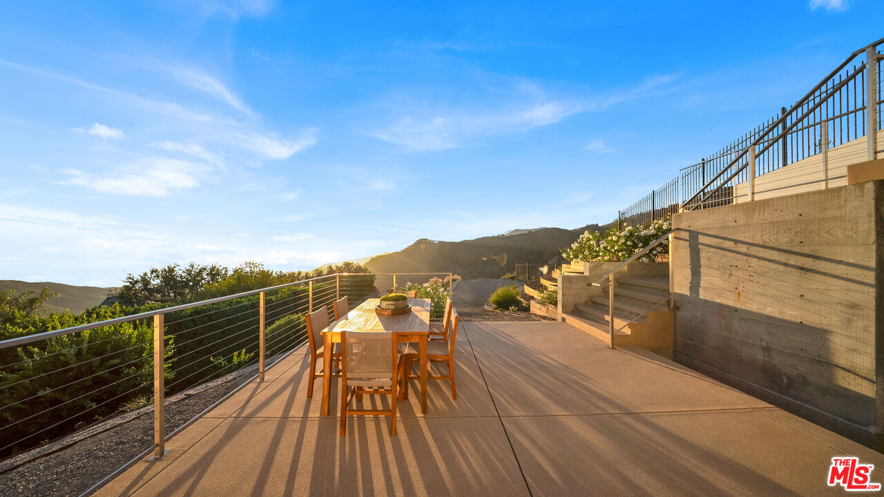 2915 Tuna Canyon Road Topanga, CA 90290 - Photo 41 of 45 a view of balcony with wooden floor and fence