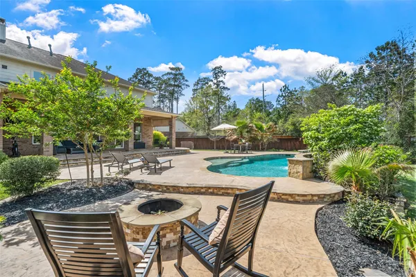 $965,000 | 26 Verdin Place, The Woodlands, TX 77389