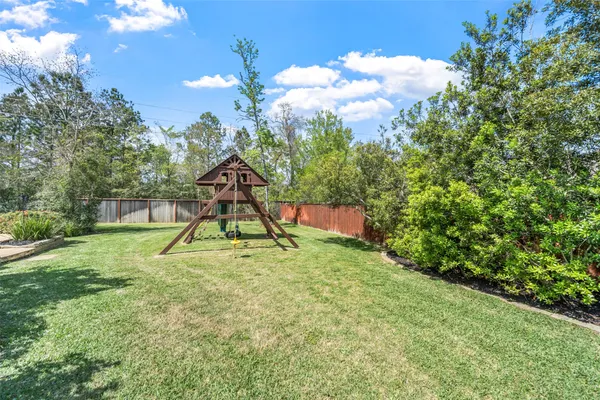 $965,000 | 26 Verdin Place, The Woodlands, TX 77389