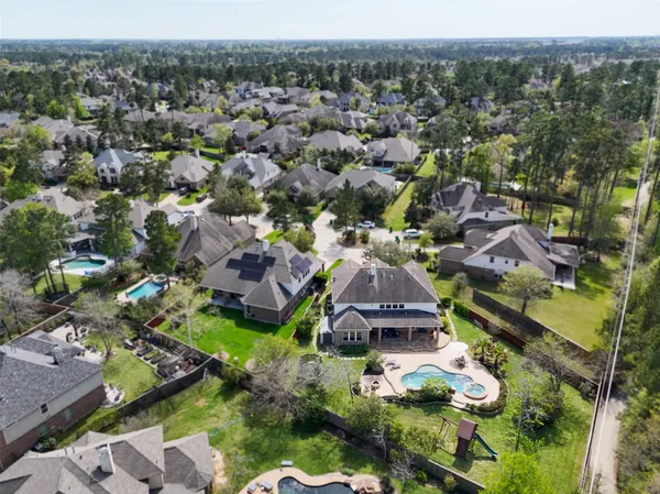 $965,000 | 26 Verdin Place, The Woodlands, TX 77389