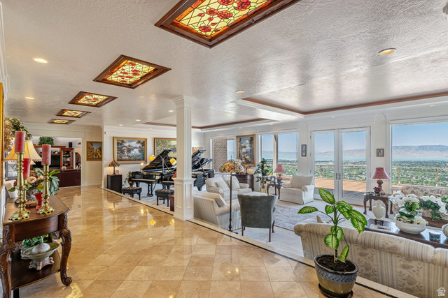 4093 North Imperial Way Provo, UT 84604 - Photo 13 of 96 Expansive formal living area featuring checkerboard tile flooring, recessed lighting, and multiple stained-glass ceiling panels