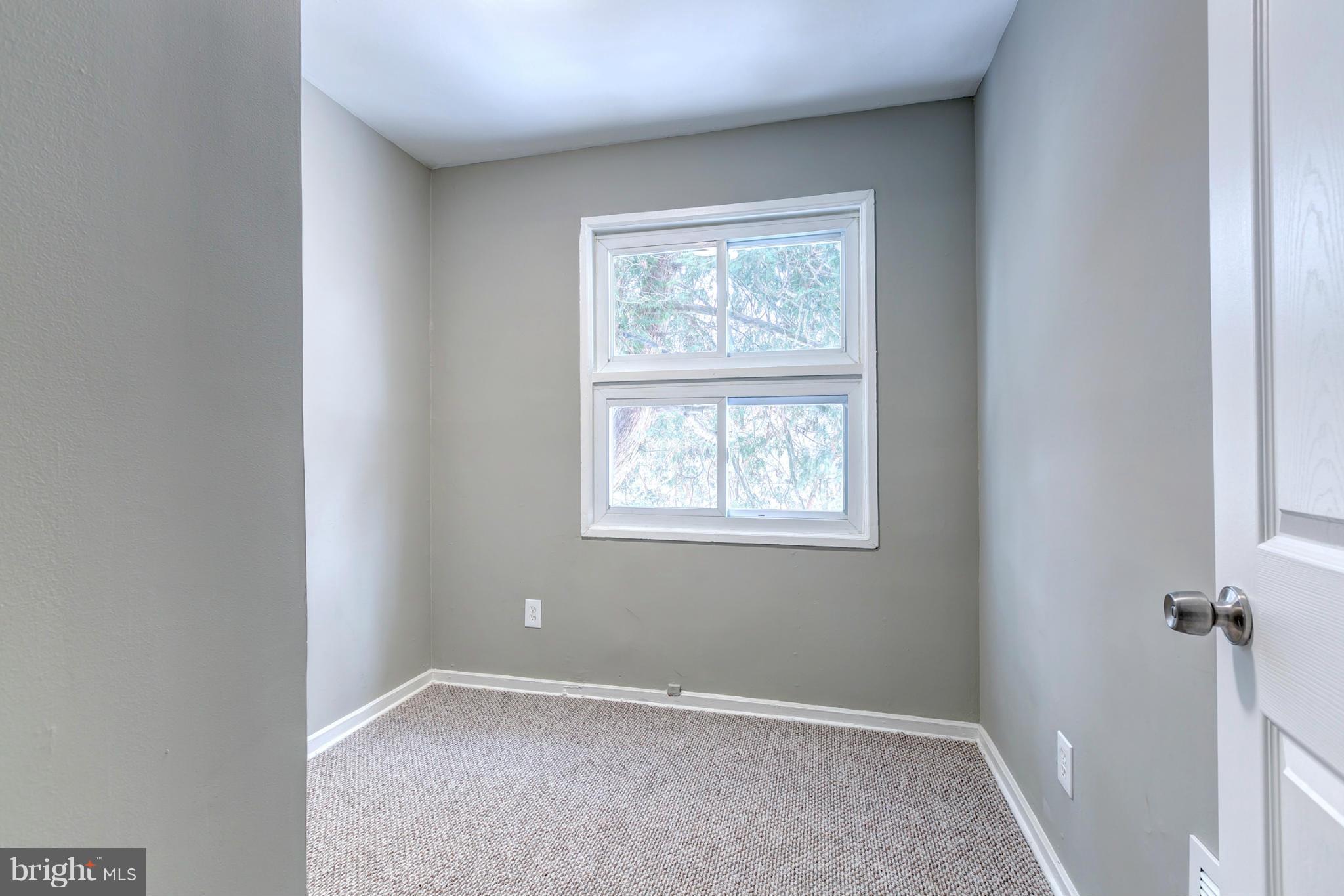 12108 Bluhill Road Silver Spring, MD 20902 - Photo 23 of 30 an empty room with windows
