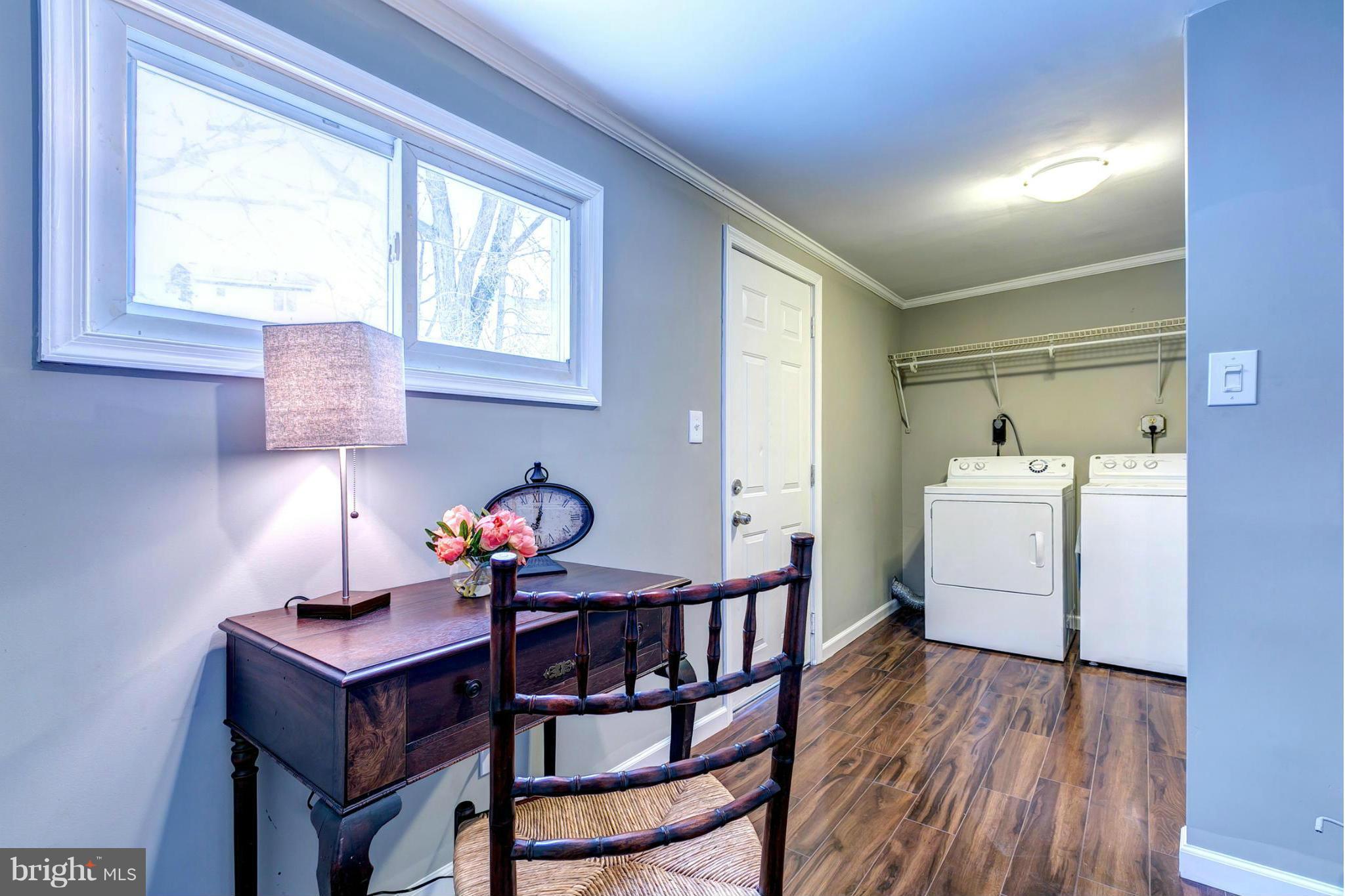 12108 Bluhill Road Silver Spring, MD 20902 - Photo 27 of 30 a room with furniture and window