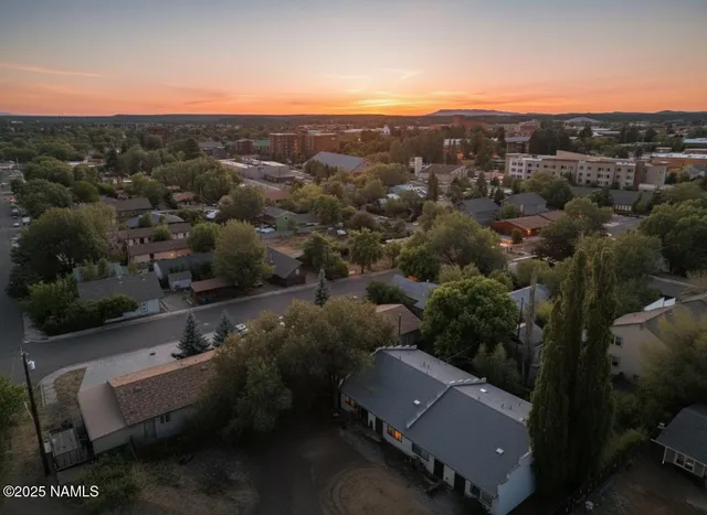 an aerial view of residential house with outdoor space