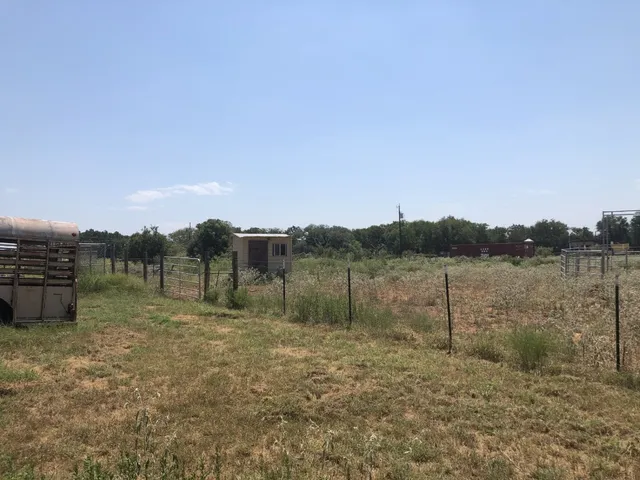 a view of lake with green space
