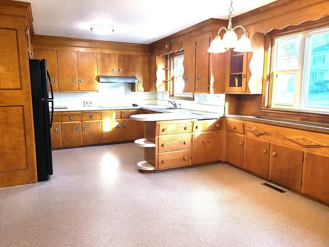 a bathroom with a sink a toilet and a bathtub
