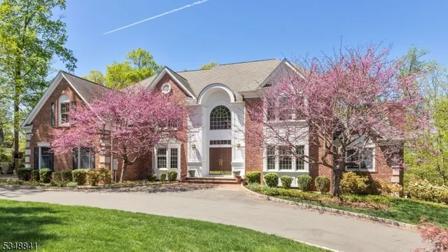 front view of a house with a garden