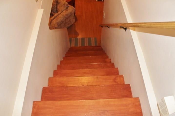 55 Saunders Road Poland, ME 04274 - Photo 32 of 34 Wood Staircase to Lower Level