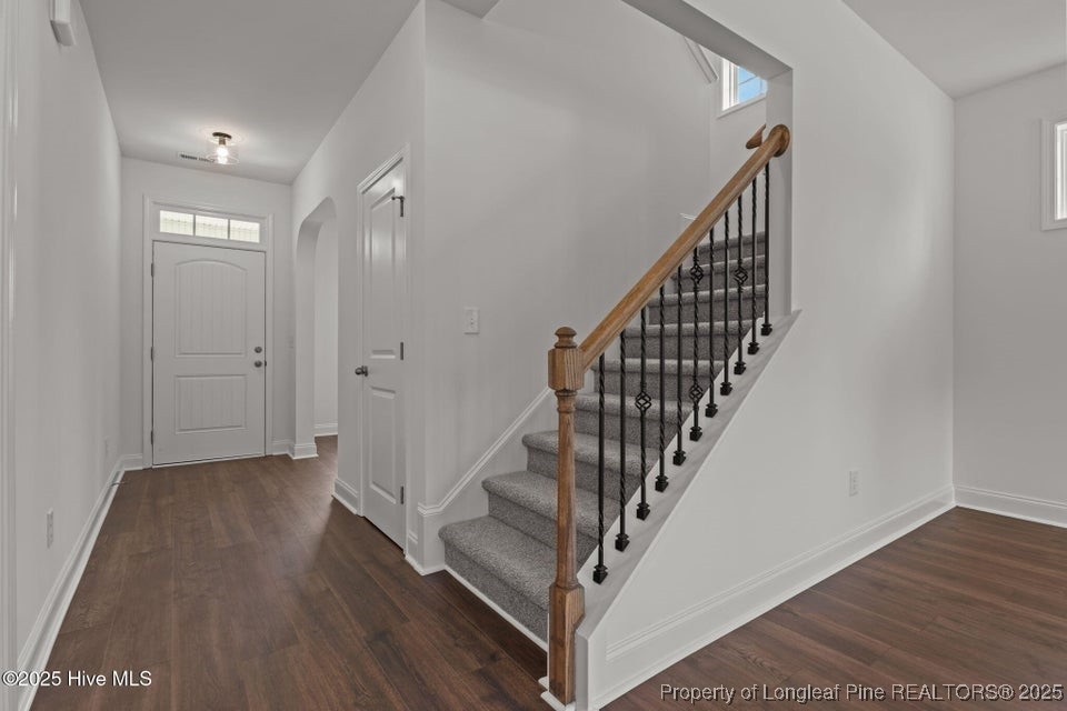 200 Dove Road Cameron, NC 28326 - Photo 12 of 46 a view of a hallway with wooden floor and entryway