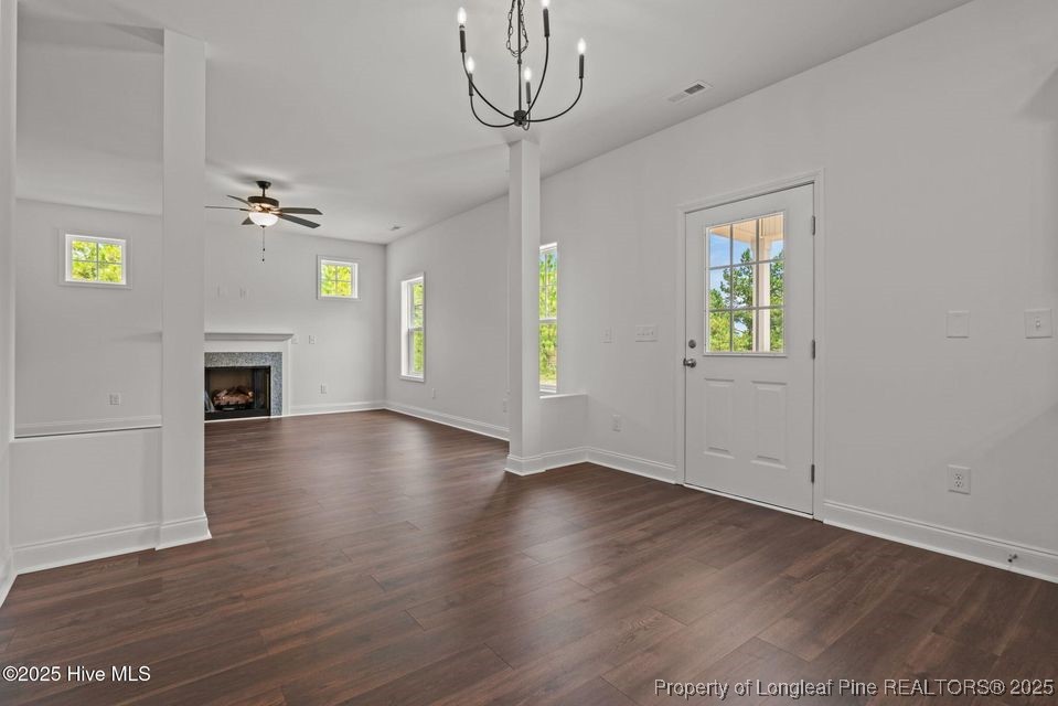 200 Dove Road Cameron, NC 28326 - Photo 23 of 46 a view of an empty room with a window and wooden floor