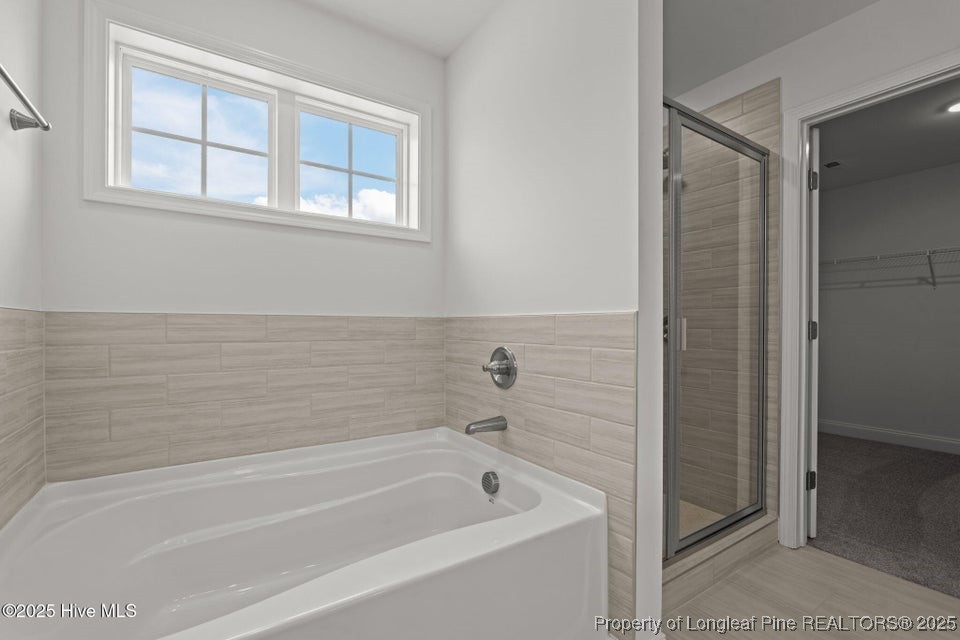 200 Dove Road Cameron, NC 28326 - Photo 34 of 46 a bathroom with a bathtub
