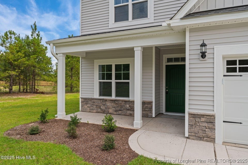 200 Dove Road Cameron, NC 28326 - Photo 38 of 46 a front view of a house with a garden