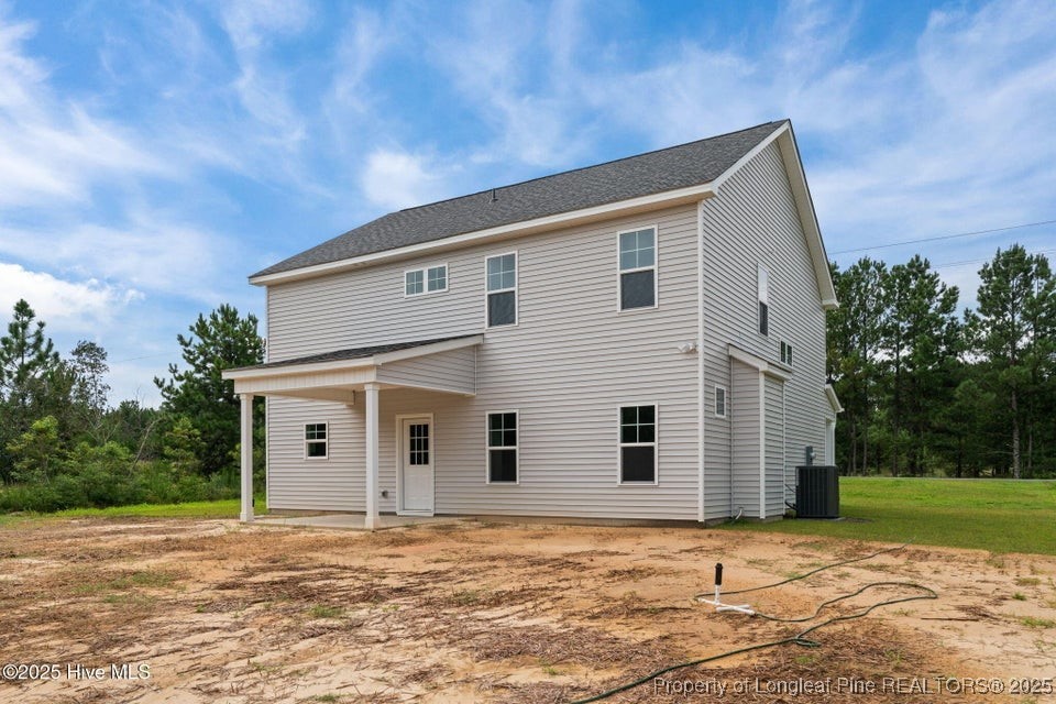 200 Dove Road Cameron, NC 28326 - Photo 40 of 46 a view of a house with backyard and trees