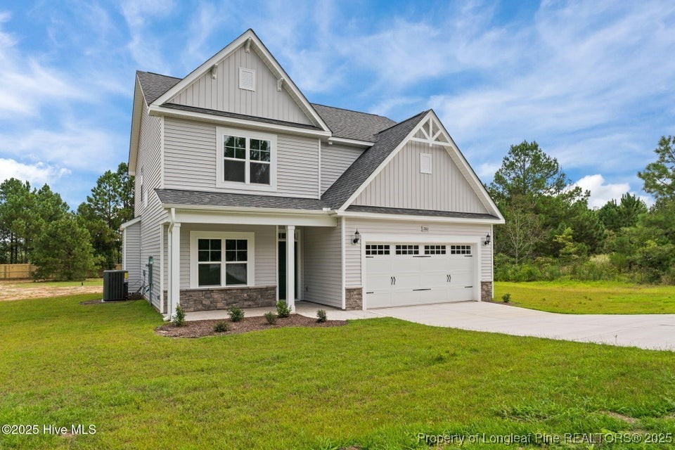 200 Dove Road Cameron, NC 28326 - Photo 4 of 46 a view of a house with a yard