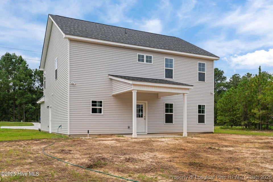 200 Dove Road Cameron, NC 28326 - Photo 42 of 46 a view of a house with backyard and trees