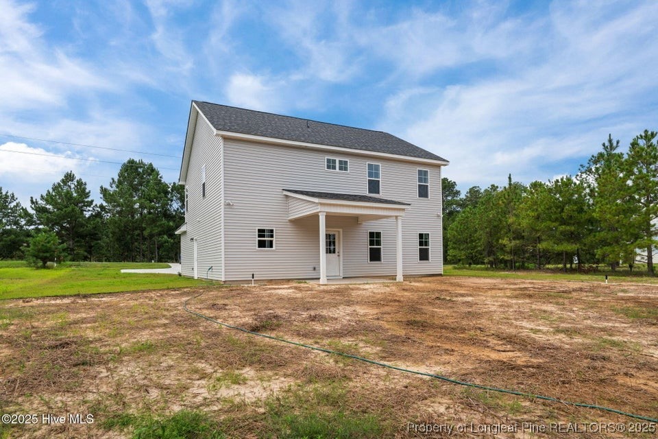 200 Dove Road Cameron, NC 28326 - Photo 43 of 46 a front view of a house with a yard