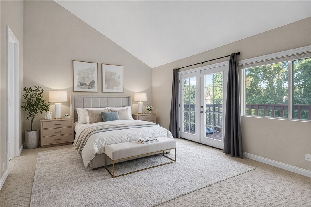 720 Ridgeview Road Anaheim Hills, CA 92807 - Photo 17 of 36 a spacious bedroom with a large bed and a large window