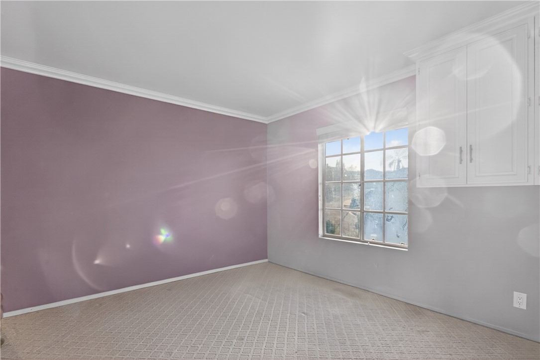 720 Ridgeview Road Anaheim Hills, CA 92807 - Photo 20 of 36 an empty room with windows and cabinet