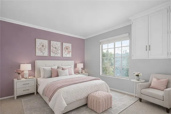 a bedroom with a bed and a couch