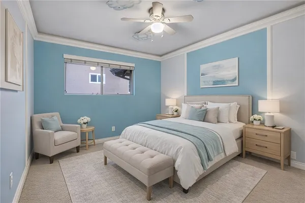 a bedroom with a bed and a couch