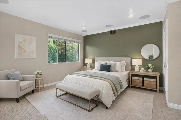 a bedroom with a bed and window