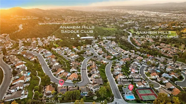 an aerial view of residential building with parking space