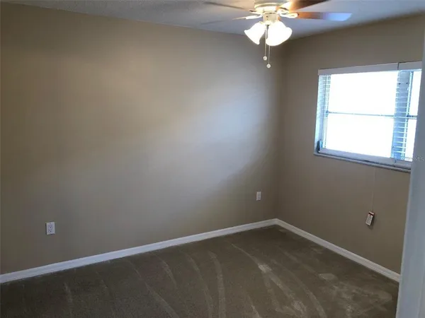 an empty room with a window